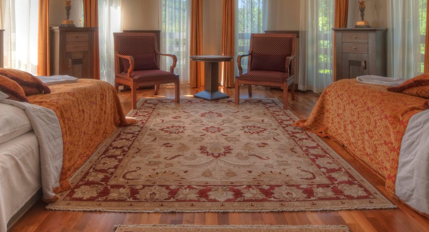 oriental rug on hardwood floor in sitting room